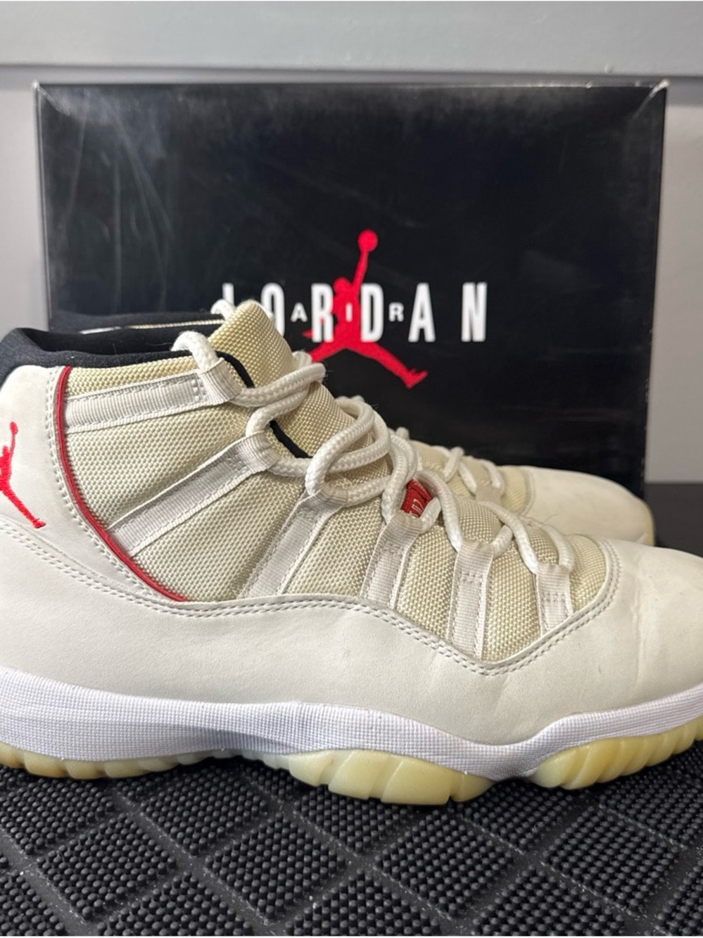 Jordan Men’s High-Top Sneakers in Cream with Red Accents